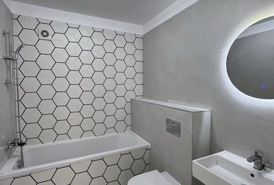 Apartament cu 3 camere decomandat în Tractorul - 2