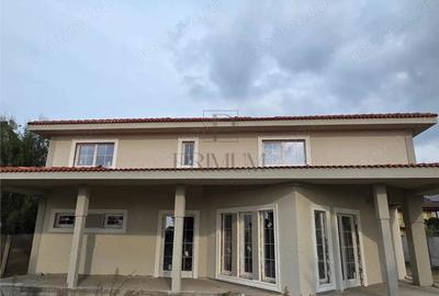 Casa individuala superba - teren 730 mp - garaj - 5 dormitoare - living 57mp. - 4