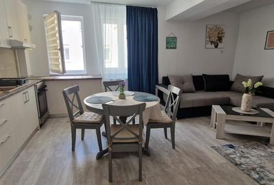 Apartament cu 2 camere decomandat, mobilat în Tractorul - 9