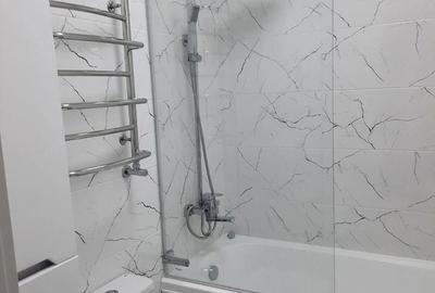 Garsonieră decomandată în Titan