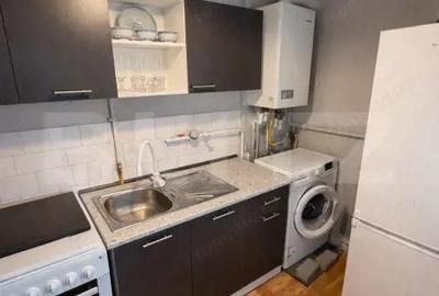 Garsonieră decomandată în Central - 7