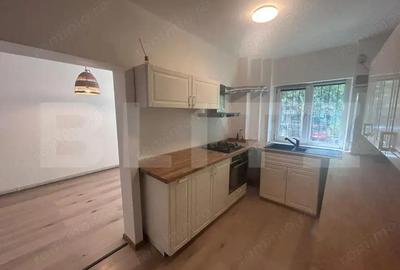 Apartament cu 2 camere, decomandat, centrala si AC, parter, cartier 1 Mai - 6