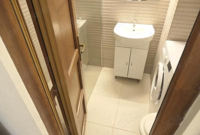 Garsonieră decomandată în Central - 9