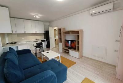 Apartament cu 2 camere semidecomandat, mobilat în Tractorul