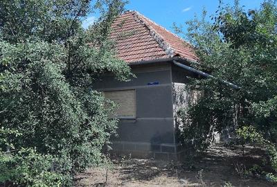 Casă cu Teren 1000 Mp în Central