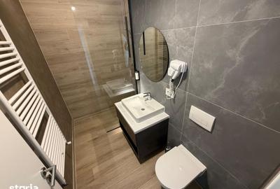Apartament cu 2 camere decomandat în Tractorul