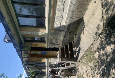 Casă cu 4 camere cu Teren 1800 Mp în Lăcusteni