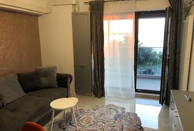 Apartament cu 2 camere semidecomandat, mobilat în Central