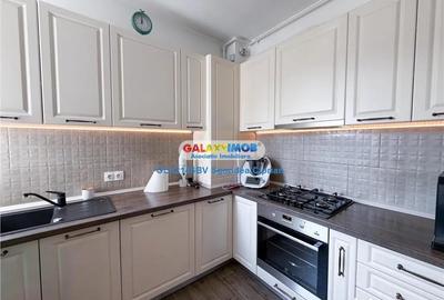 Apartament cu 3 camere decomandat în Tractorul