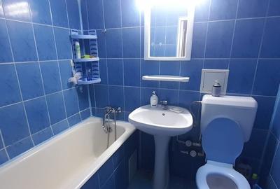 Apartament cu 3 camere semidecomandat în Ozana