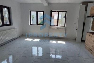 Apartament cu 3 camere semidecomandat în Rahova