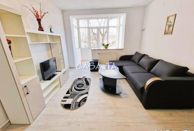 Apartament cu 2 camere semidecomandat, mobilat în Central