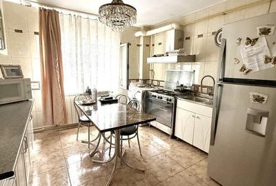 Apartament cu 3 camere decomandat în Buzaului