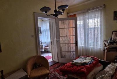 Casă cu 5 camere cu Teren 108 Mp în Muncitoresc
