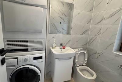 Casă cu 4 camere în 1 Decembrie