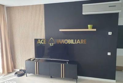 Apartament cu 2 camere semidecomandat, mobilat în Costin Georgian