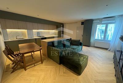 Apartament cu 2 camere semidecomandat, mobilat în Central