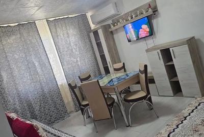 Apartament cu 3 camere semidecomandat în Central