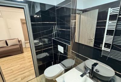 Apartament cu 2 camere semidecomandat, mobilat în Tractorul - 10