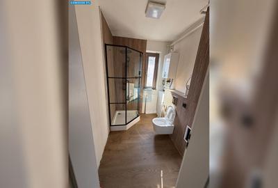 Apartament cu 3 camere semidecomandat în Borhanci