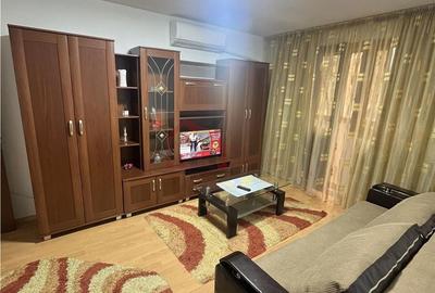 Apartament cu 2 camere semidecomandat, mobilat în Tei
