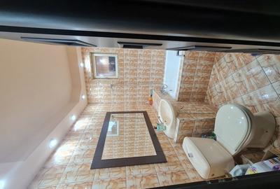 Apartament cu 4 camere decomandat în Tractorul - 1