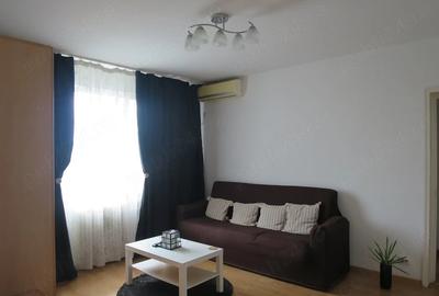 Apartament cu 3 camere semidecomandat, mobilat în Basarab
