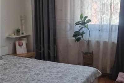 Apartament cu 3 camere decomandat în Buziașului