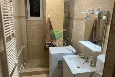 Apartament cu 3 camere semidecomandat, mobilat în Calea București - 9