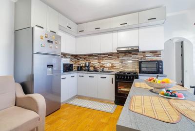 Apartament cu 3 camere semidecomandat, mobilat în Adunații-Copăceni - 12