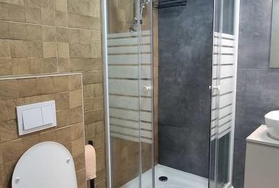 Apartament cu 3 camere decomandat în Tractorul - 1
