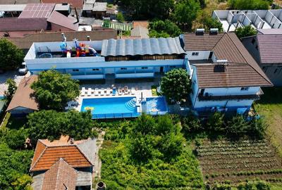 Casă cu 15 camere cu Teren 1000 Mp în Schitu - 2