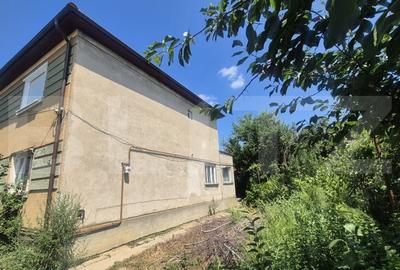 Casă individuală cu 4 camere cu Canalizare în Aurel Vlaicu