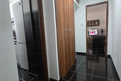 Apartament cu 3 camere semidecomandat, mobilat în Micro 5 - 10
