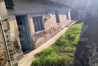 Casă individuală cu 2 camere semidecomandat cu Teren 246 Mp în Gherla