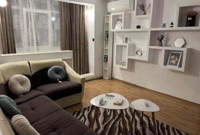 Apartament cu 2 camere semidecomandat, mobilat în Podu Roș