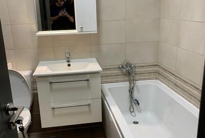 Garsonieră decomandată în Titan