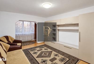 Apartament cu 3 camere decomandat în Tractorul