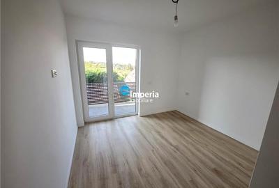 Apartament cu 3 camere decomandat în Bucium - 11