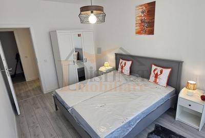 Apartament cu 3 camere decomandat în Tractorul