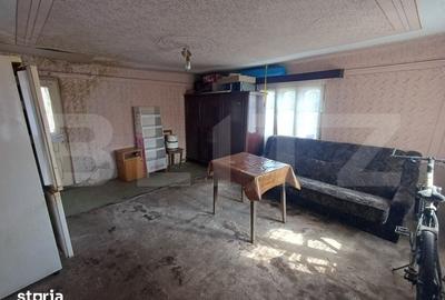 Casă cu 3 camere cu Teren 1000 Mp în Arcani