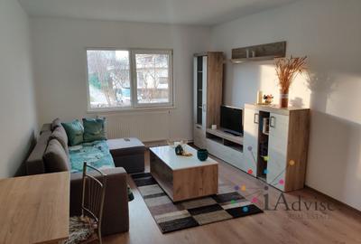 Apartament cu 3 camere decomandat în Tractorul