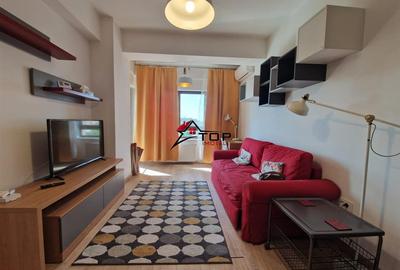 Apartament cu 2 camere semidecomandat, mobilat în Nicolina