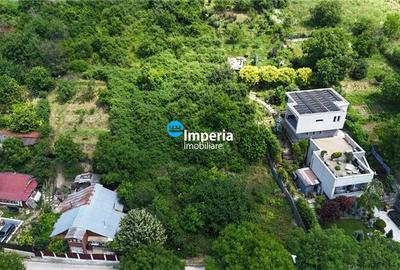 Teren Construcții intravilan de 1000 mp, în Bucium