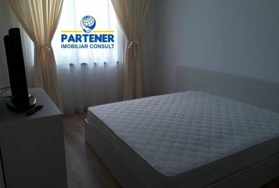 Apartament cu 3 camere semidecomandat, mobilat în Central