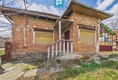 Casă cu Teren 1800 Mp în Buteni