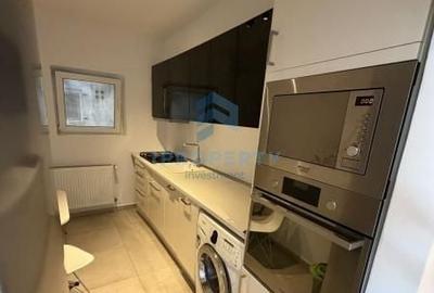 Apartament cu 3 camere în Romană