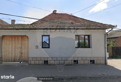 Casă cu 4 camere cu Teren 1346 Mp în Comana - 1