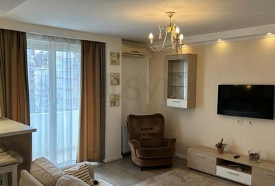 Apartament cu 2 camere semidecomandat, mobilat în P-ța Universității - 1