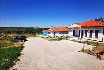Casă individuală cu 4 camere cu Teren 500 Mp în Bucium - 1